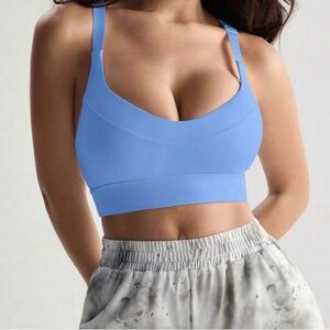 Baby blue padded sports bra criss cross back